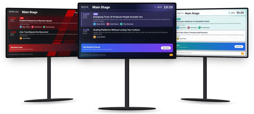 Three EventSign room screens on stands, each showing the Main Stage agenda in a different design for a fictional event: red, dark blue and light